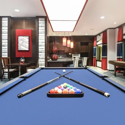 a room with a table and chairs