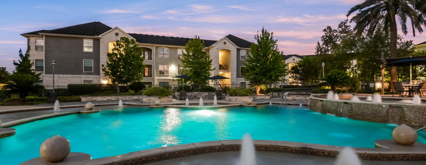 a pool in front of a house