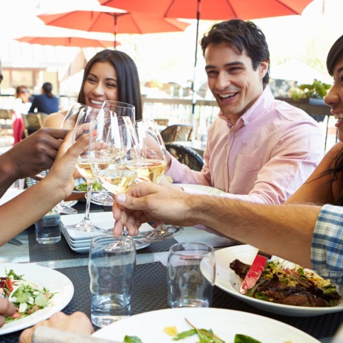 a group of people eating at a table