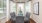 a dining room with a table and chairs
