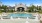 a large house with a pool