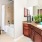 a bathroom with a tub sink and toilet