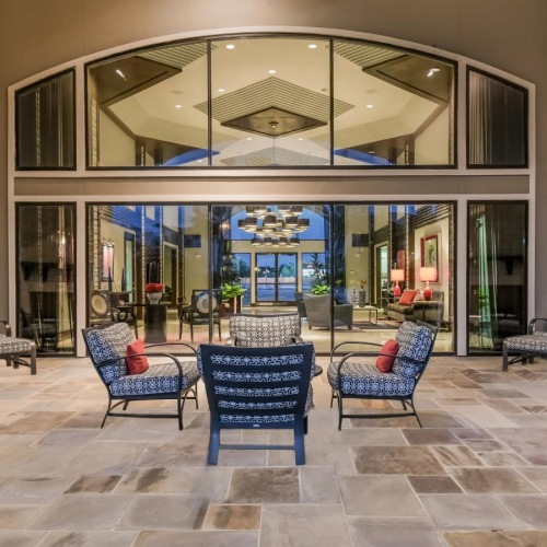 a large room with chairs and tables